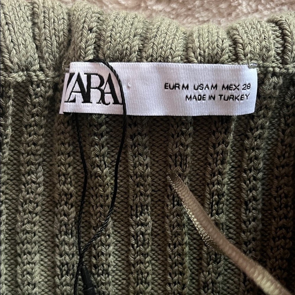 Zara medium khaki green embellished with diamonds sleeveless sweater.